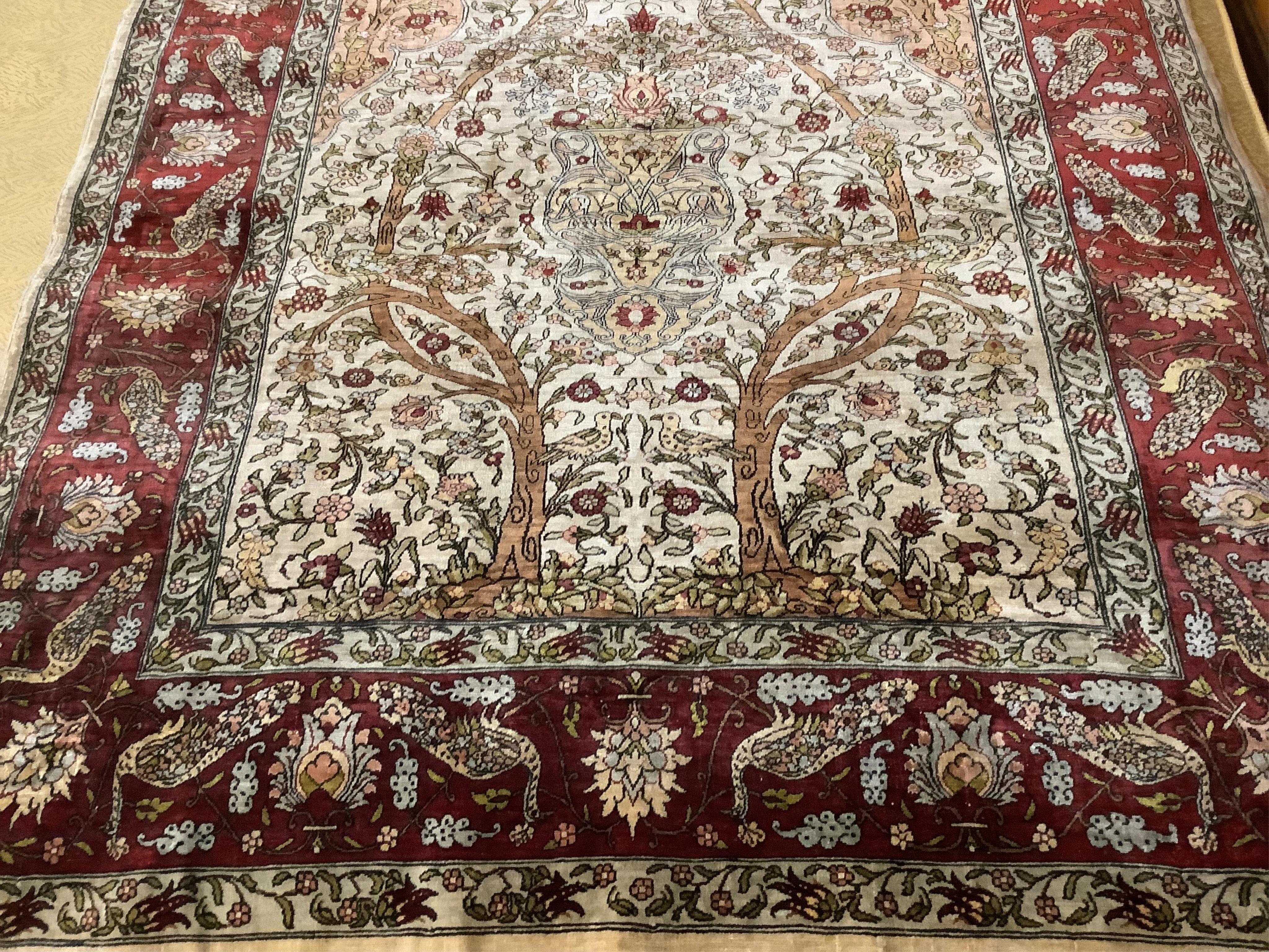 An Isfahan ivory ground part silk Tree of Life rug, 102 x 138cm. Condition - good